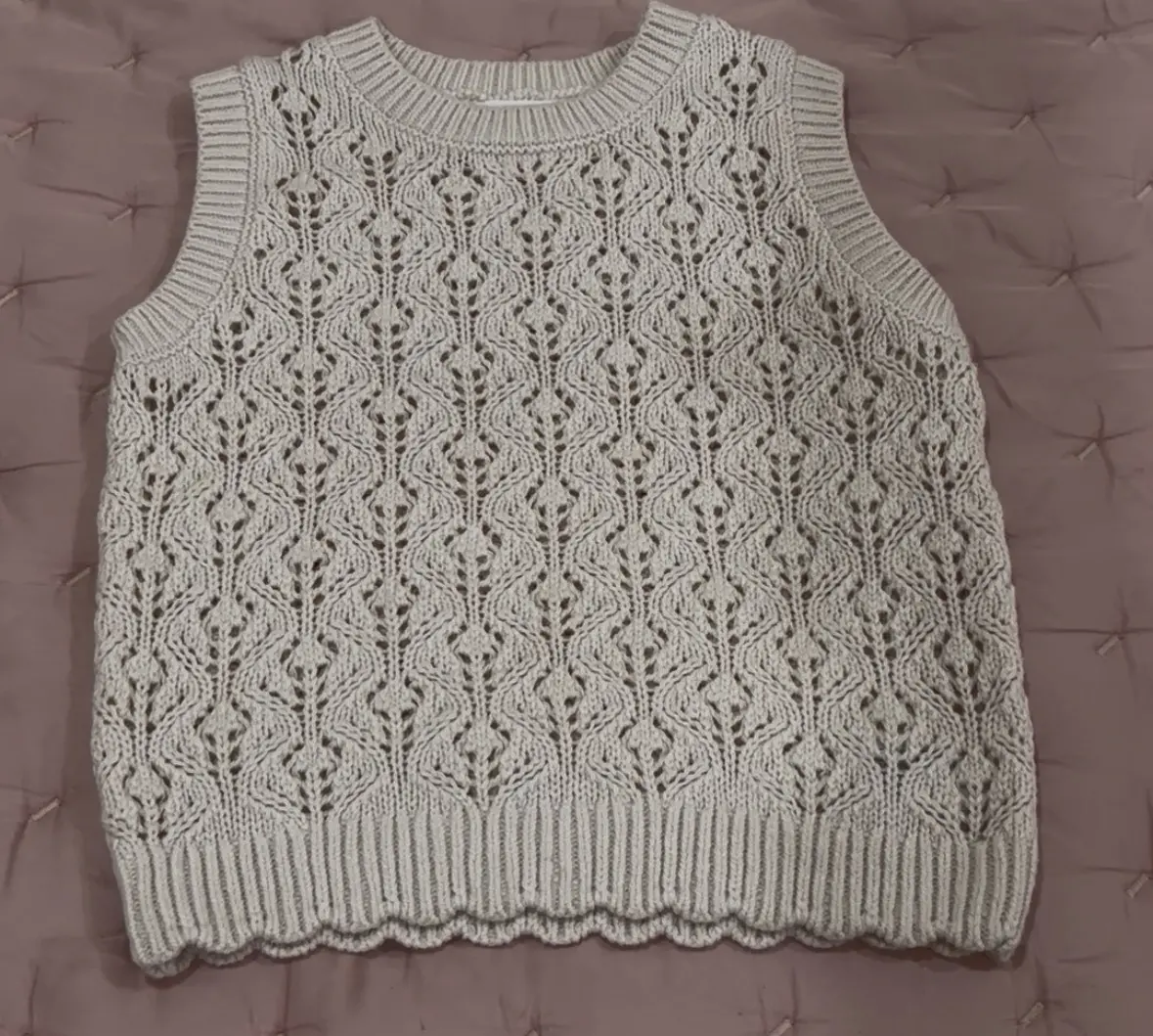White sweater vest