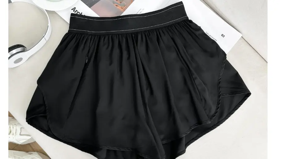 Black shorts. ALO